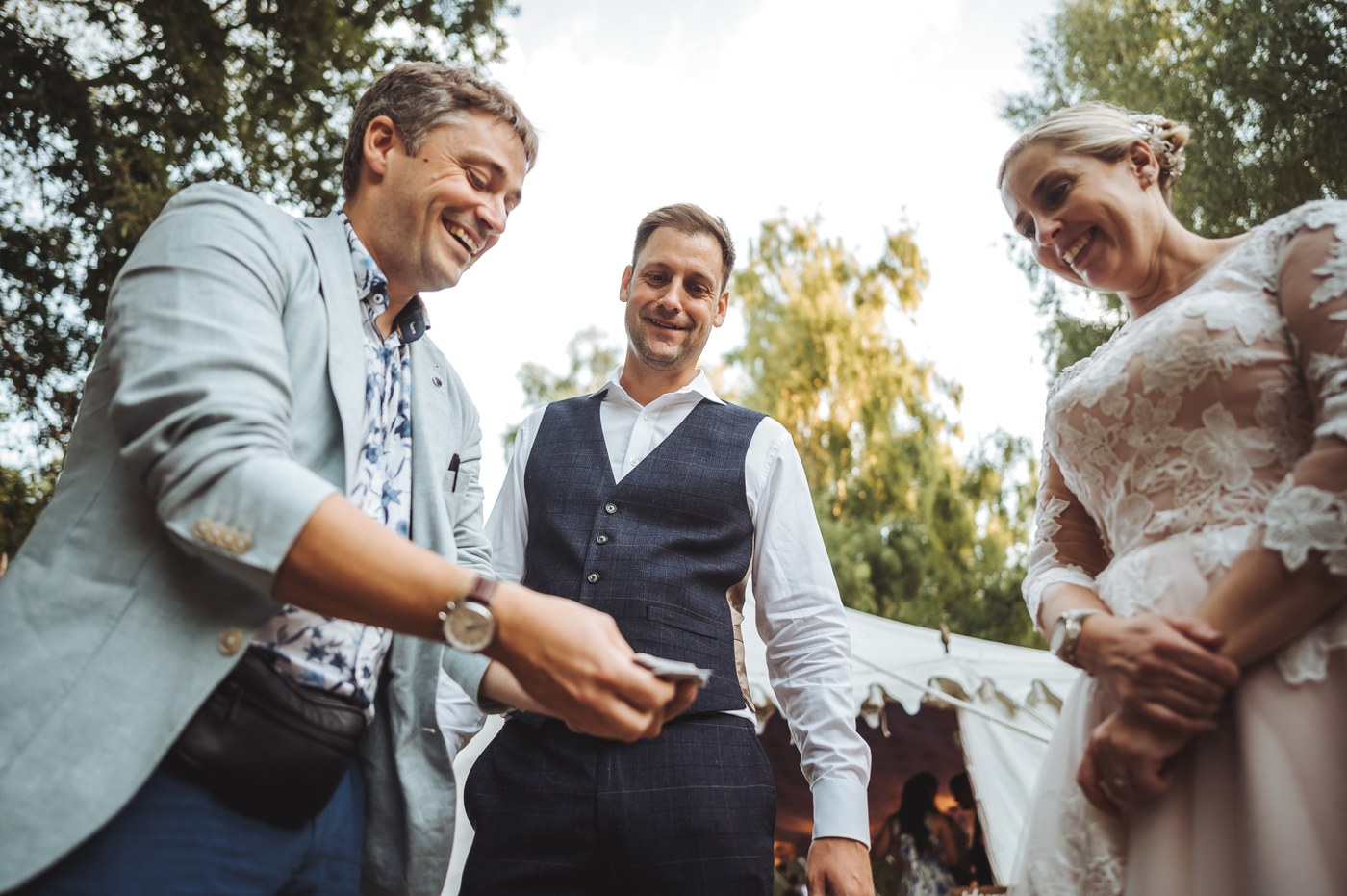 James Sheridan performing close-up magic at a wedding