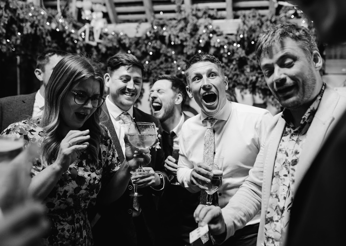 James Sheridan performing close-up magic at a wedding